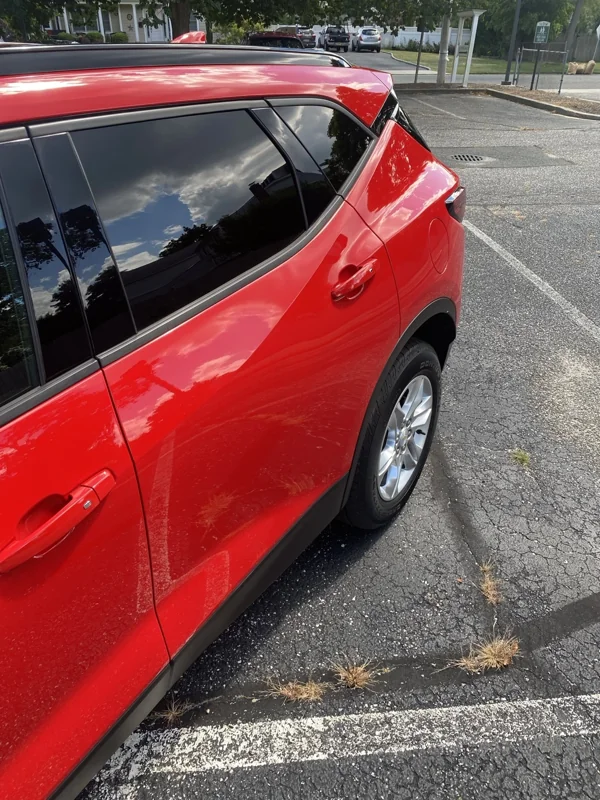 Red car paint gloss and reflections